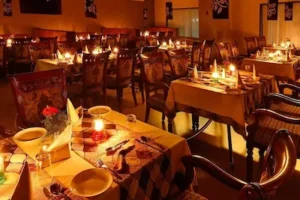 Spice Grove Resort dining hall experience included in 9-day Kerala tour packages in Kerala