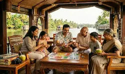 Family enjoying a Kerala houseboat tour package in Alleppey backwaters